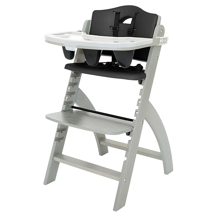 Abiie Beyond Junior Wooden High Chair with Tray - Adjustable and Convertible High Chair for Babies and Toddlers - 6 Months to 250 Lb - Water Resistant - Misty Grey Wood with Black Pearl Cushion