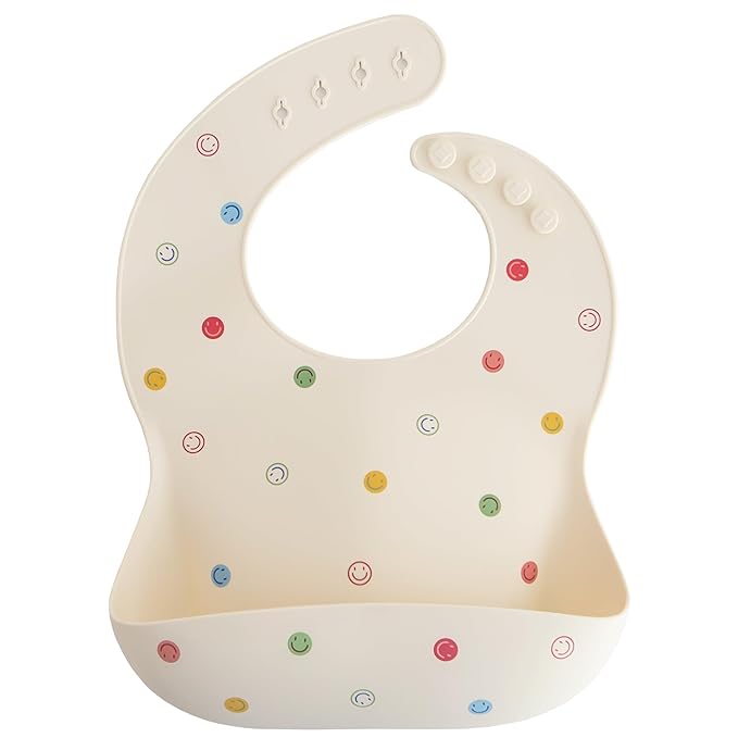 mushie Silicone Baby Bib | Adjustable Fit Waterproof Bibs (Smiley Face)