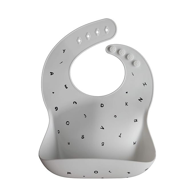mushie Silicone Baby Bib | Adjustable Fit Waterproof Bibs (Letters White)