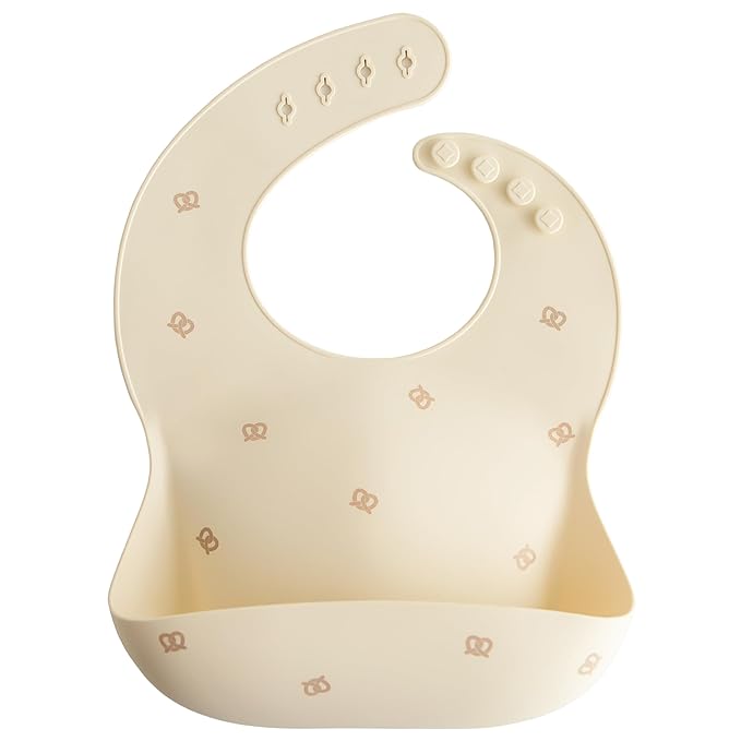mushie Silicone Baby Bib | Adjustable Fit Waterproof Bibs (Pretzel)