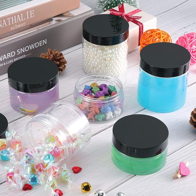 SATINIOR 24 Pieces Empty Clear Plastic Jars with Lids Round Storage Containers Wide-Mouth for Beauty Product Cosmetic Cream Lotion Liquid Butter Craft and Food (Black Lid, 2 oz)